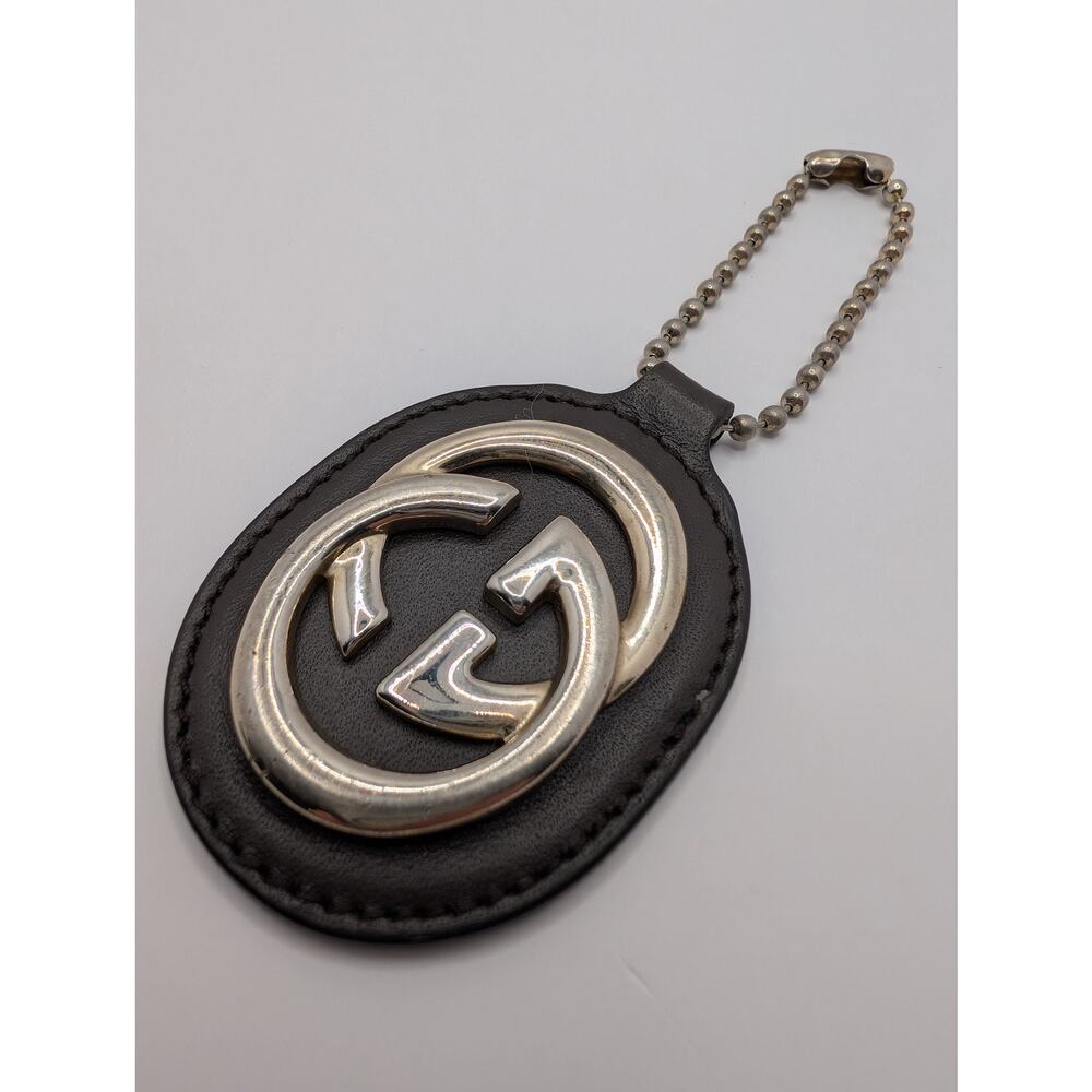 Gucci Interlocking GG Leather Oval Keychain Bag Charm Black Silvery Gold Tone - Picture 3 of 6